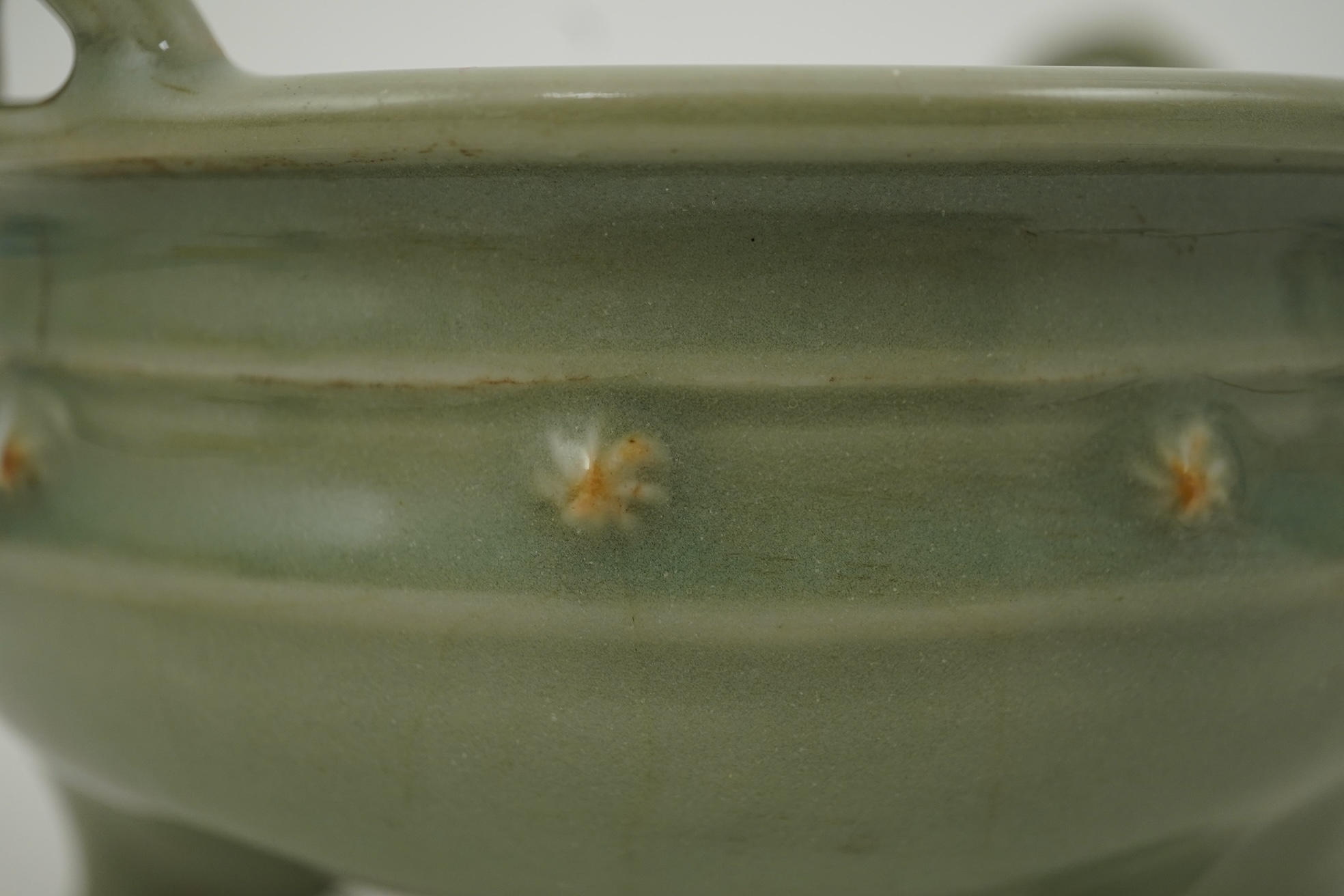 A Chinese Longquan celadon crackle glazed tripod censer, Ming dynasty or later
